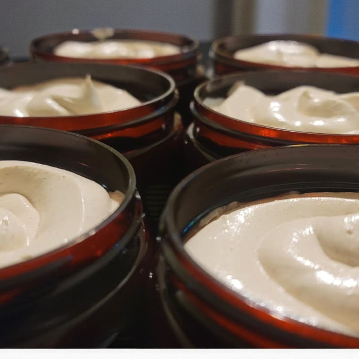 Haven Bliss Skincare Clove & Bay Body Cream in amber jars, whipped ivory texture, 6 oz size.